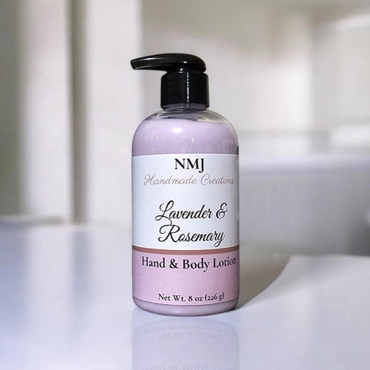 NMJ Handmade Creations' Lavender & Rosemary hand and body lotion is elegantly displayed in a clear bottle with lavender and white labeling, set against a modern bathroom backdrop.






